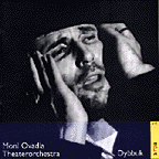 Album cover: b/w Ovadia holds head in pain.