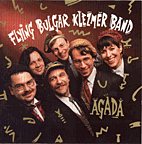 Album cover: beautiful lettering and the band smiles.