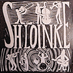 Album cover: nice b/w lino of band playing. awesomely bad lettering